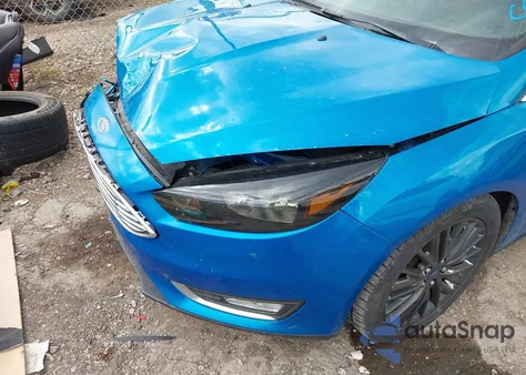 2015 Ford Focus Titanium from USA, damaged, VIN 1FADP3J27FL287249